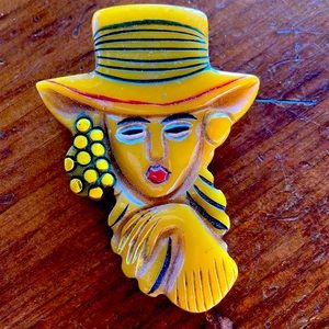 Vintage Carved Gyi Shin Young Bakelite Brooch